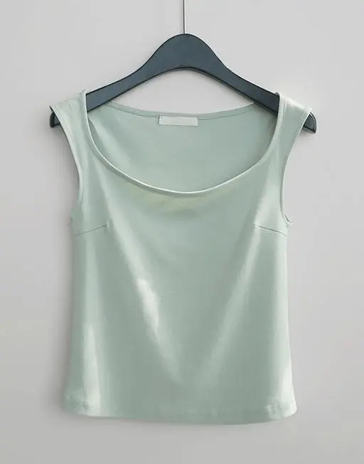 curved dart sleeveless TOP